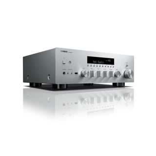 Silver audio amplifier with Yamaha logo on a white background